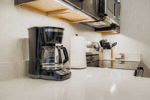 Fridge, microwave, coffee/tea maker, toaster