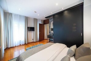 1 slaapkamer, een strijkplank/strijkijzer, wifi, beddengoed