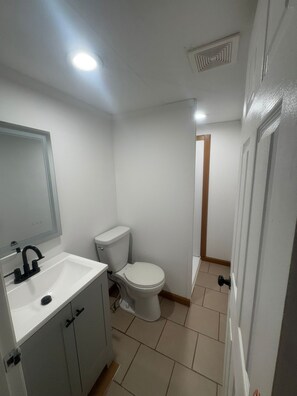 Hair dryer, towels, soap, toilet paper
