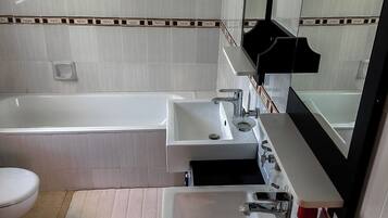 Hair dryer, towels, soap, toilet paper