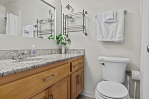 Hair dryer, towels, soap, toilet paper