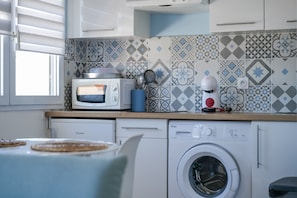 Fridge, microwave, coffee/tea maker, electric kettle