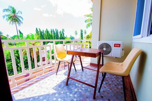 Deluxe Double Room, Balcony | Desk, laptop workspace, free WiFi