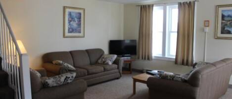 Condo 3 Bedrooms (Building C) | Living area | 34-inch flat-screen TV with satellite channels, Netflix, DVD player