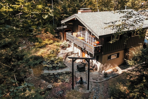 A look at our dreamy backyard garden and custom #25 chair lift swing.