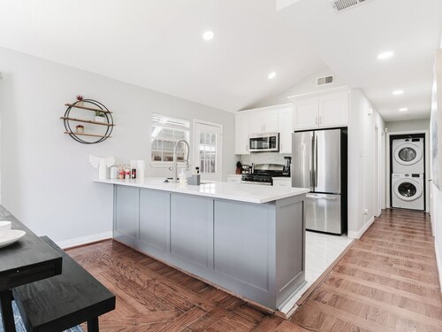 Charming Modern 4BR Home - Lux - Backyard.