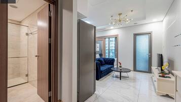 Deluxe Apartment, 1 King Bed, City View | Minibar, desk, free WiFi, bed sheets