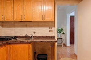 Fridge, microwave, oven, dining tables