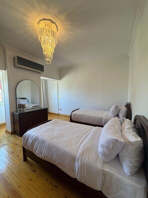 3 عدّة غرف نوم ومكواة/لوح كي وواي فاي مجانًا وملاءات أسرّة