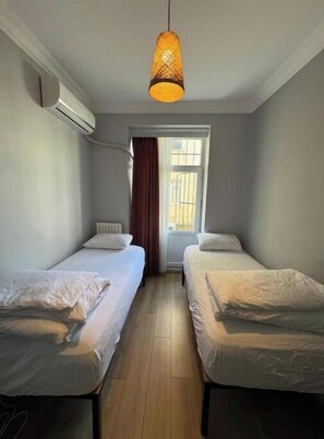 2 slaapkamers, een strijkplank/strijkijzer, wifi, beddengoed