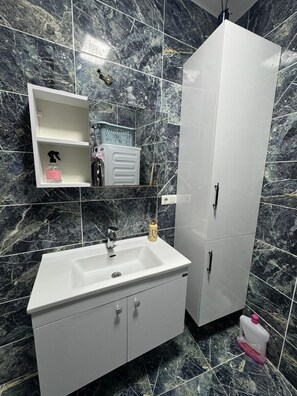 Hair dryer, towels, soap, toilet paper