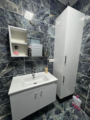 Hair dryer, towels, soap, toilet paper