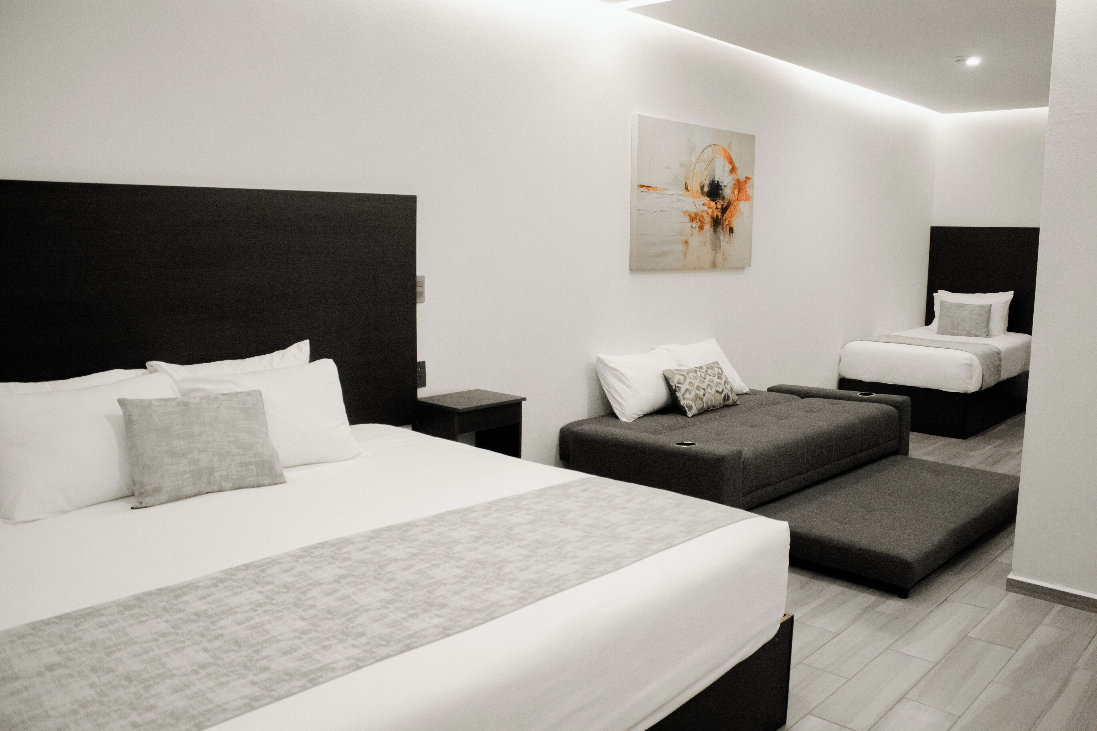 Family Room, Multiple Beds | In-room safe, individually furnished, desk, laptop workspace