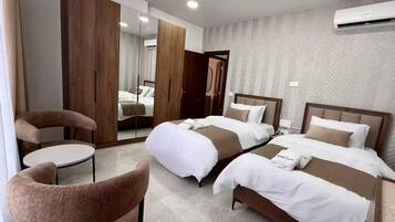 2 chambres, fer et planche à repasser, Wi-Fi, draps fournis