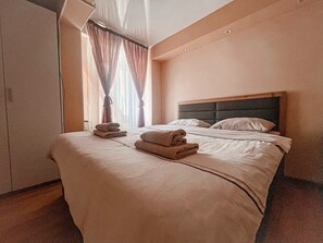 Chambre Standard double | Coffre-fort, fer et planche Ă repasser, accĂšs au Wi-Fi (inclus)