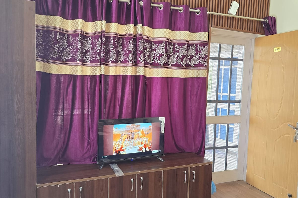 Standard Double Room, Balcony, Garden View | Laptop workspace, iron/ironing board