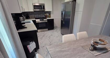Welcome to The Hangar, a newly remodeled travel-themed stay, 4 minutes from BDL.