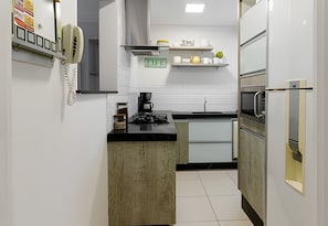 Fridge, microwave, coffee/tea maker, toaster