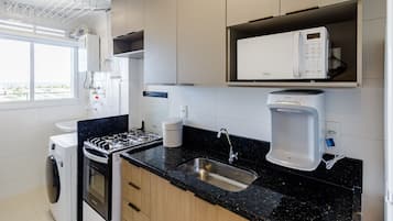 Fridge, microwave, oven, cookware/dishes/utensils