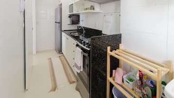 Fridge, microwave, cookware/dishes/utensils