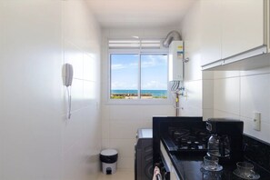 Fridge, microwave, cookware/dishes/utensils