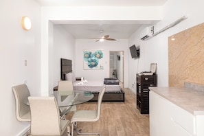 Standard Apartment | Living area | 32-inch LCD TV with cable channels