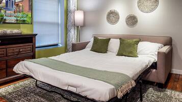 1 bedroom, desk, iron/ironing board, travel cot