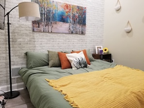 1 bedroom, desk, iron/ironing board, travel crib