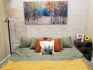 1 bedroom, desk, iron/ironing board, travel crib