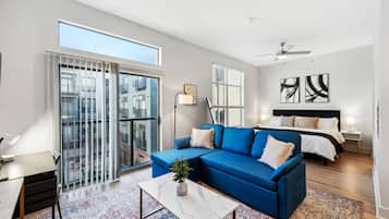 1 bedroom, desk, iron/ironing board, travel crib