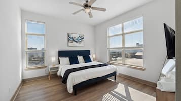 1 bedroom, desk, iron/ironing board, travel crib