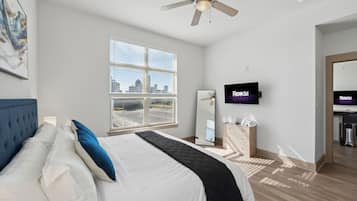 1 bedroom, desk, iron/ironing board, travel crib