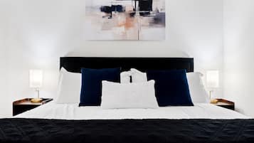 1 bedroom, desk, iron/ironing board, travel crib