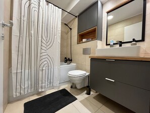 Hair dryer, towels, soap, shampoo