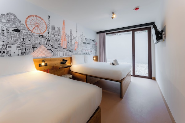 Standard Triple Room | Memory foam beds, desk, blackout drapes, soundproofing