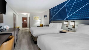 A hotel room with two beds, a desk, a chair, and a TV. - Comfort Inn & Suites Lexington South (Lexington)