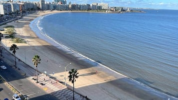 Na praia, toalhas de praia