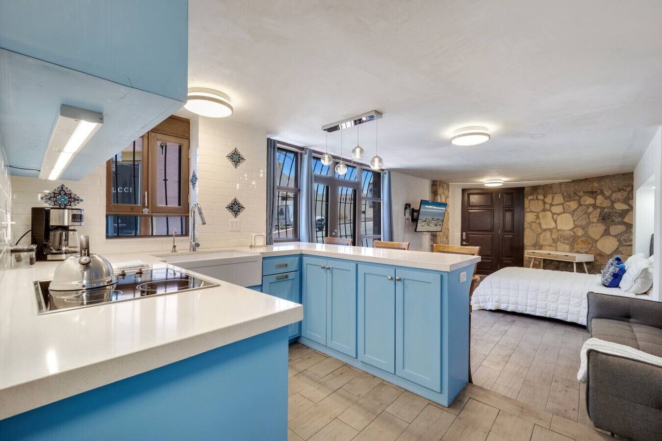 Fridge, microwave, stovetop, coffee/tea maker