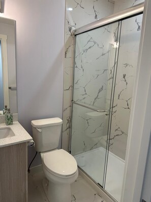 Shower, eco-friendly toiletries, hair dryer, towels - Relax in Legacy | Modern Basement Suite with Free Parking & Great Location (Calgary)