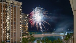 A high-rise hotel with a view of a beach and a pool area. - Monthly Ilikai 1142 Ocean / Lagoon /  King Bed, Sofa Bed (Waikiki)