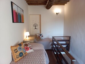 2 dormitorios, tabla de planchar con plancha, wifi y ropa de cama