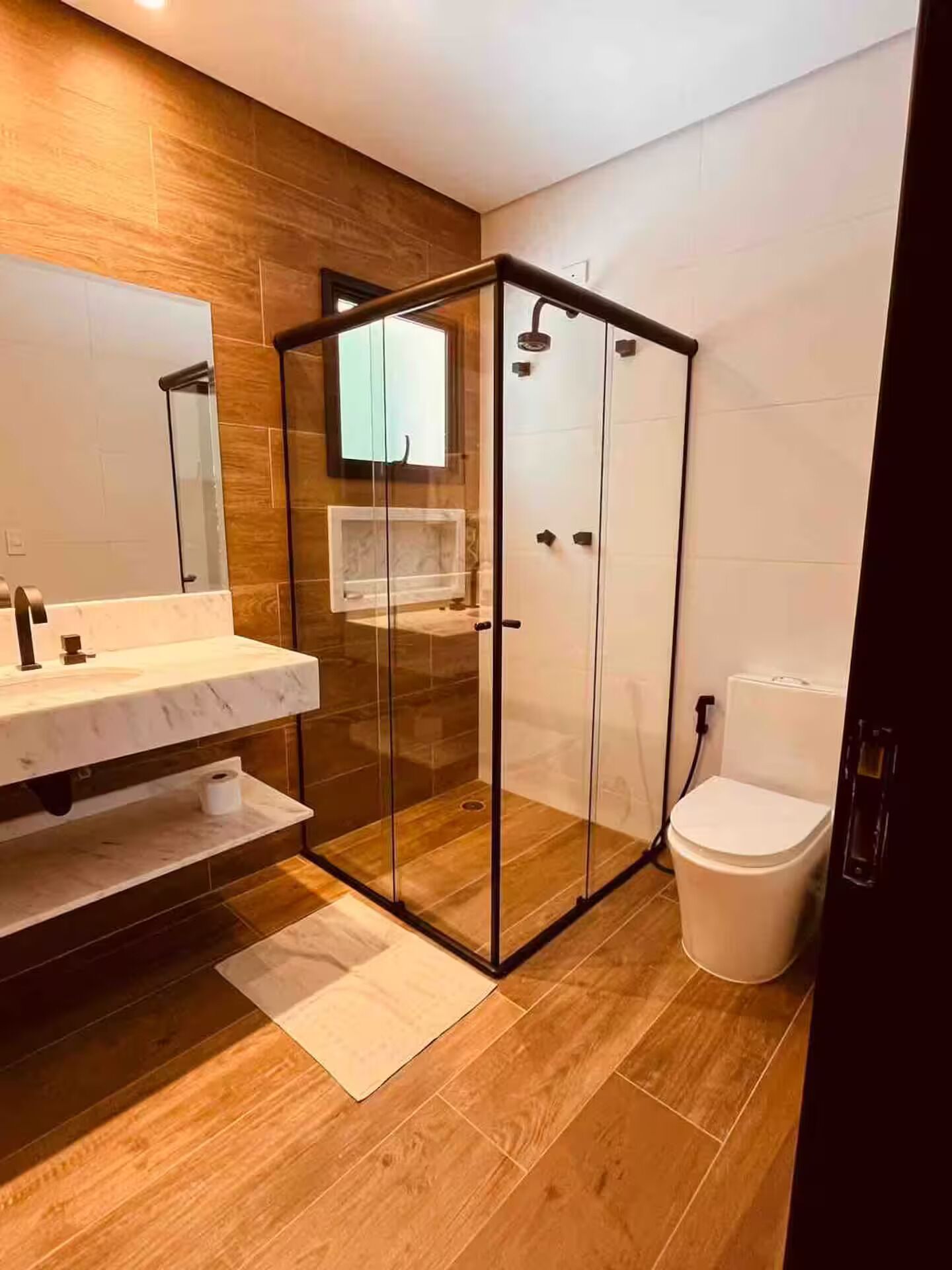 Shower, hair dryer, soap, toilet paper