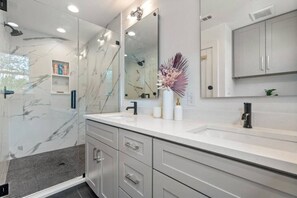 Hair dryer, towels, soap, shampoo
