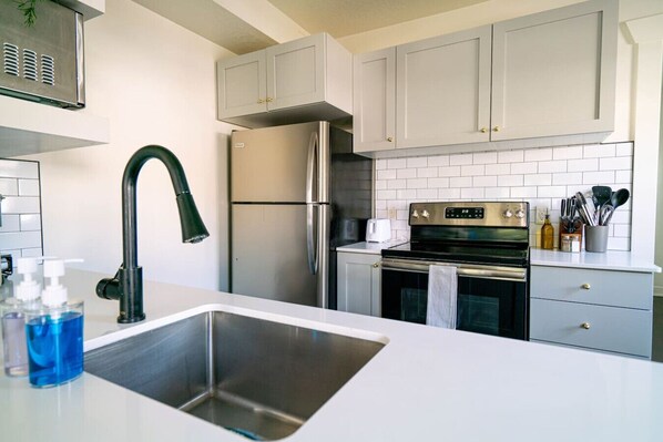 Fridge, microwave, oven, stovetop