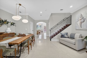 Luxury Townhome, 3 Bedrooms, Courtyard View | Living area | 65-inch Smart TV with digital channels