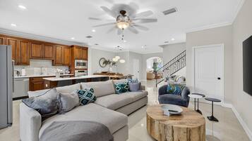 Luxury Townhome, 3 Bedrooms, Courtyard View | Living area | 65-inch Smart TV with digital channels