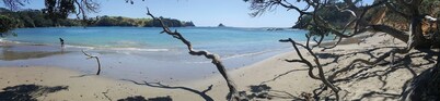 Bach at the beach
- Situated at Taiharuru (east coast near Whangarei, Northland)