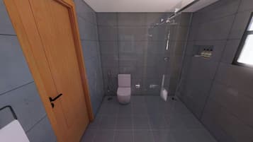 Un baño moderno con puerta de madera, un inodoro, ducha y suelo de baldosas.