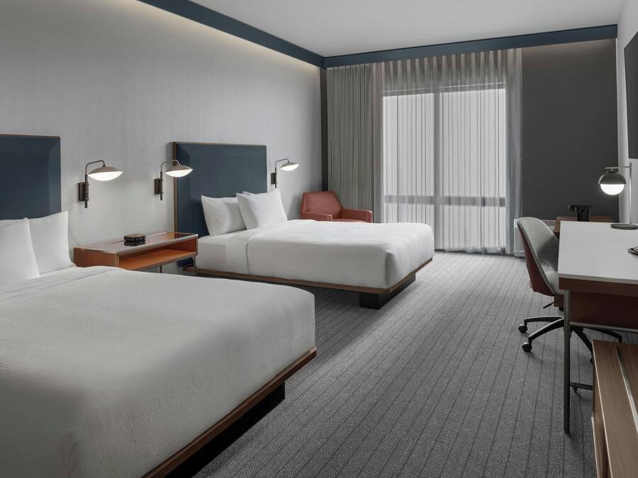 Premium bedding, down comforters, pillowtop beds, desk