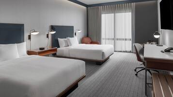 Premium bedding, down comforters, pillowtop beds, desk